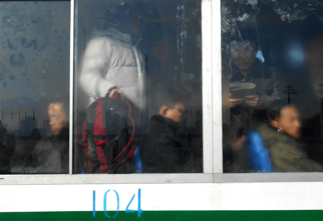 Passengers inside a trolley in North Korea. Photo: Daniel Wizenberg
